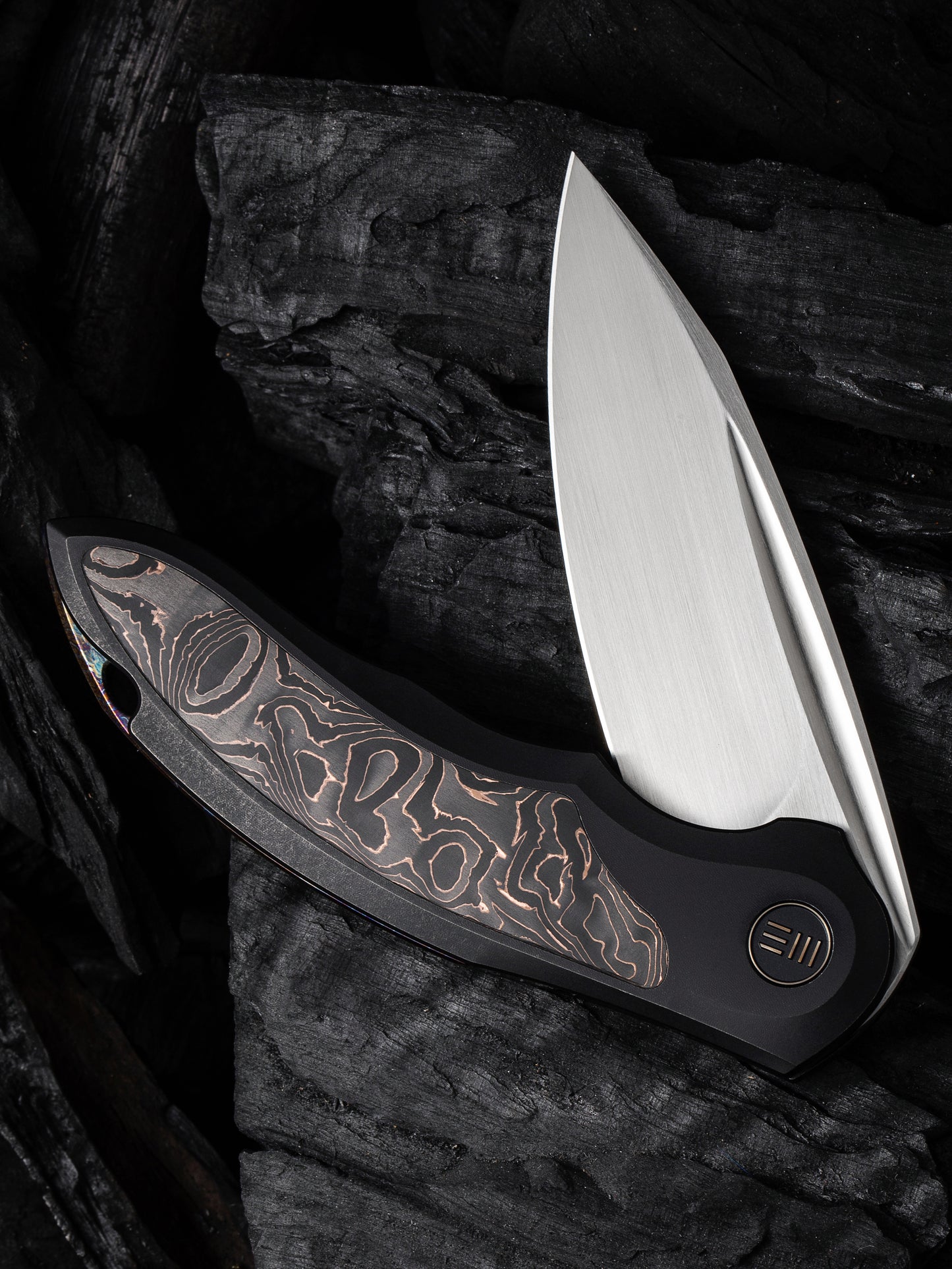 WE Makani Limited Edition 3.61" CPM 20CV Black Titanium Copper Foil Carbon Fiber Folding Knife by Anton Tkachenko WE21048B-1
