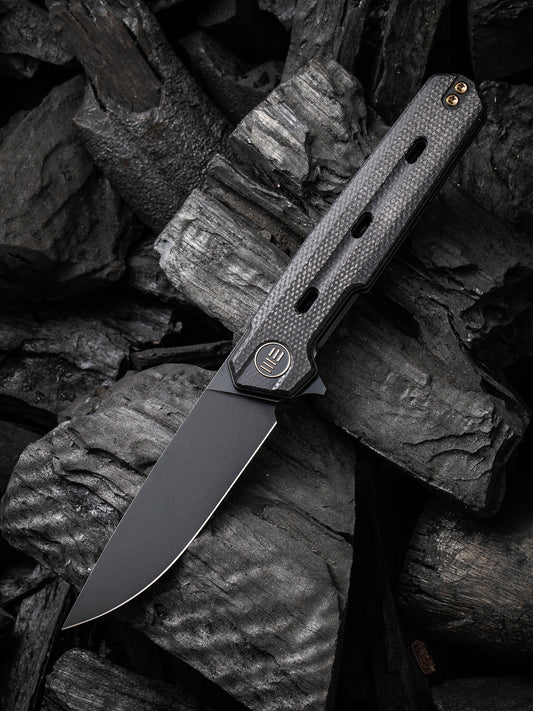 WE Navo 3.25" CPM 20CV Black Canvas Micarta Titanium Folding Knife by Ostap Hel WE22026-1