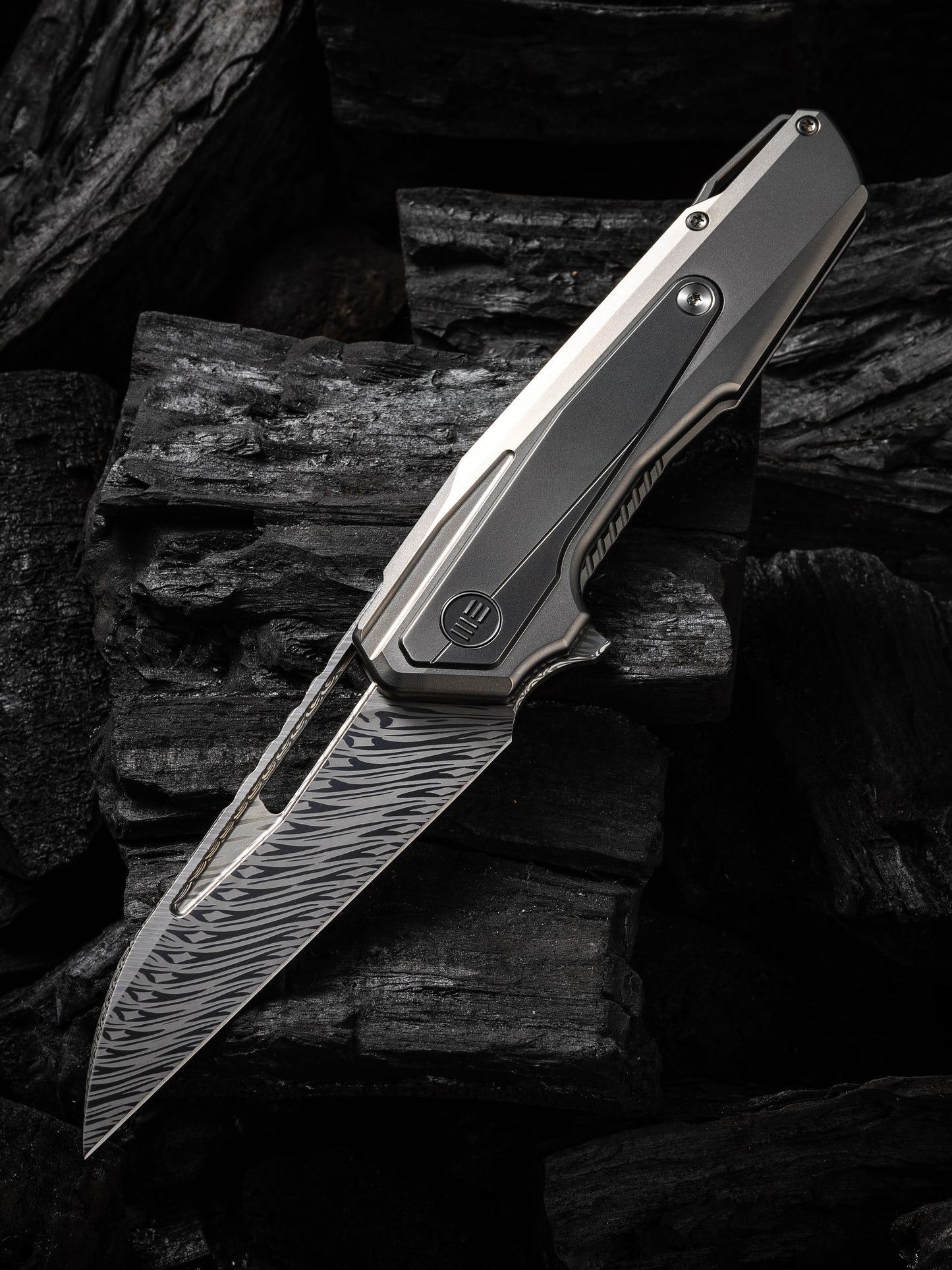 WE Falcaria 3.64" Fafnir Damasteel Polished Gray Titanium Folding Knife by Maciej Torbe WE23012B-DS1