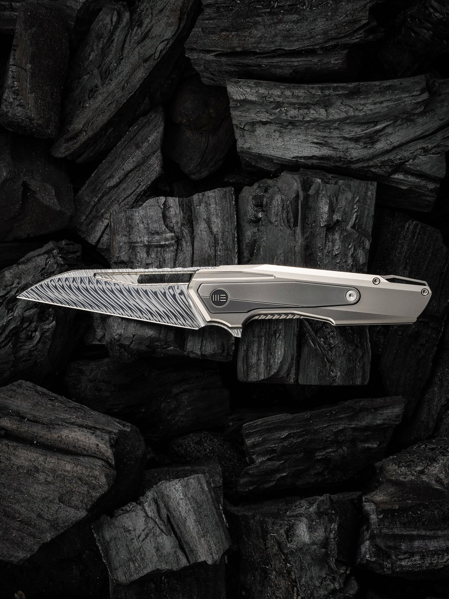 WE Falcaria 3.64" Fafnir Damasteel Polished Gray Titanium Folding Knife by Maciej Torbe WE23012B-DS1