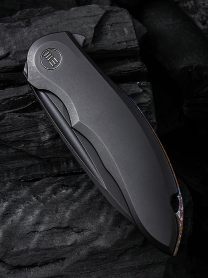 WE Makani Limited Edition 3.61" CPM 20CV Black/Black Titanium Folding Knife by Anton Tkachenko WE21048-1