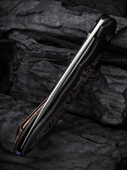WE Makani Limited Edition 3.61" CPM 20CV Black Titanium Copper Foil Carbon Fiber Folding Knife by Anton Tkachenko WE21048B-1