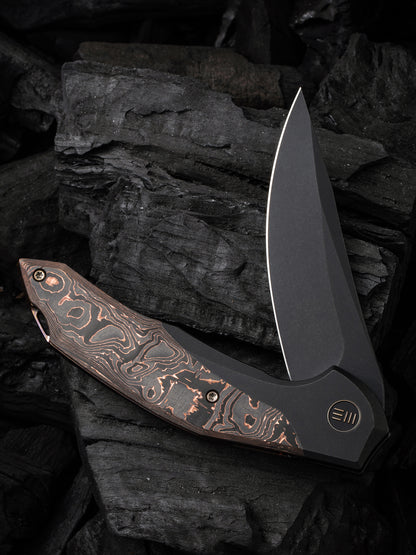 WE Merata Limited Edition 3.68" CPM 20CV Black Copper Foil Carbon Fiber Titanium Folding Knife by Anton Tkachenko WE22008B-1